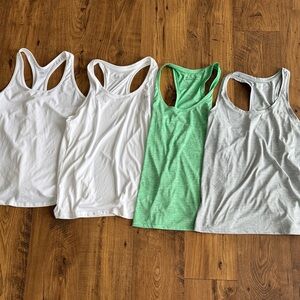 NWT/NWOT Bundle of 4 women’s athletic tank tops, size large, Under Armour, etc.